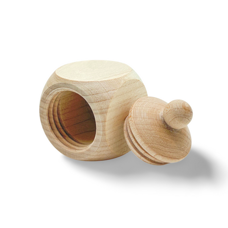 Unbemalter hölzerner Honigtopf mit passendem Deckel und abgerundetem Knopf.