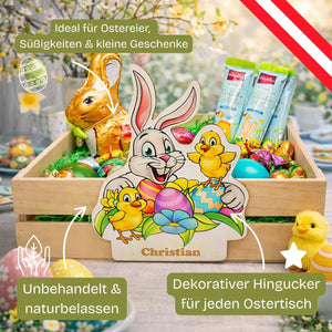 Holz Oster-Geschenkkiste mit buntem Cartoon-Hasen- und Küken-Design, personalisiert mit dem Namen »christian« in brauner Schrift.